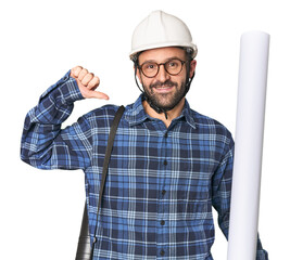 Hispanic male architect with plans feels proud and self confident, example to follow.