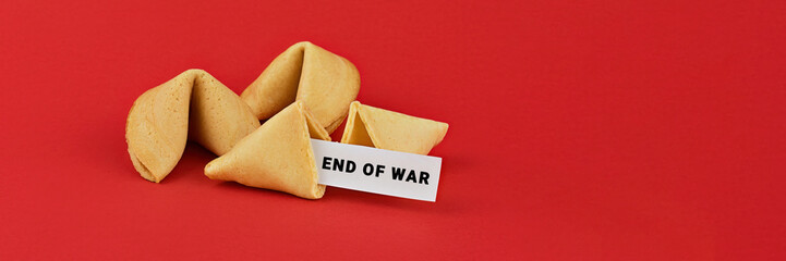 Fortune cookies and End of War message, placed on red background symbolizing optimism and peace,...
