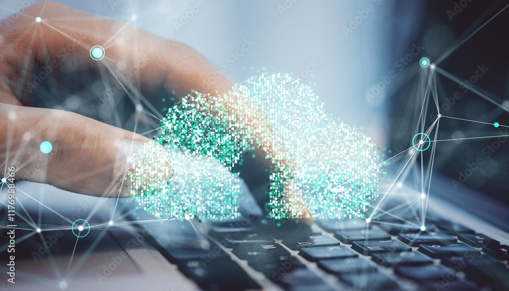 Leinwandbilder digital cloud computing concept with a hand on a keyboard and holographic cloud graphics.