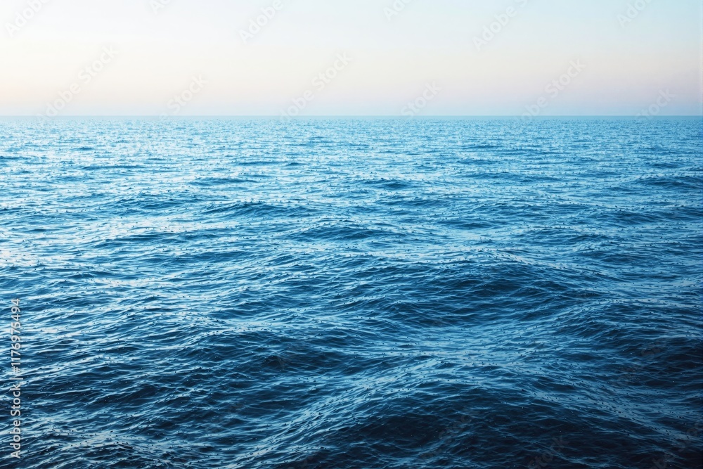 Poster Serene blue ocean waves under a calm gradient sky.