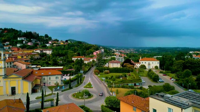 4K Aerial Drone Video of Church Belltower and Roundabout in Cavallasca, Italy on a Summer Evening