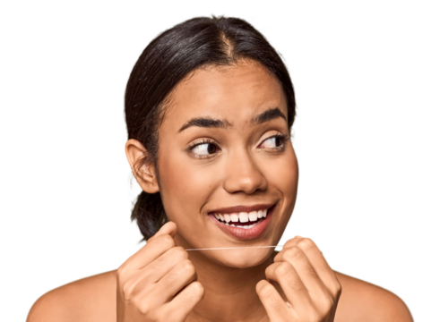 Young Filipino using dental floss, oral care focus