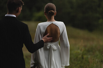 bride and groom walk