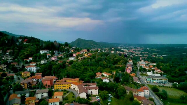 4K Aerial Drone Video of Mountainside Farmhouses in Cavallasca, Italy on a Summer Evening