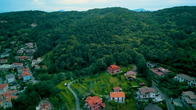 4K Aerial Drone Video of Mountainside Farmhouses and Vineyards in Cavallasca, Italy on a Summer Evening