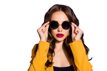Photo of cool astonishing girl watching into camera through sunglass while being isolated with purple background