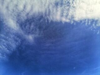 White clouds on blue sky background