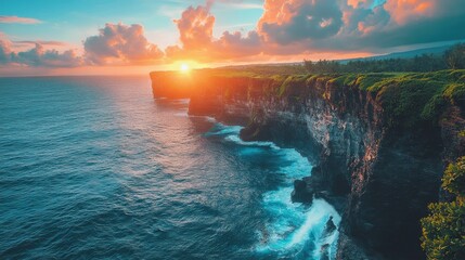 Beautiful coastal cliffs at sunset with waves crashing along the shore