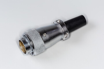 Industrial circular electrical plug connector with union nut close-up