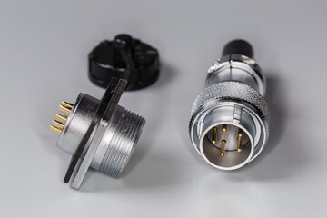 Pair of industrial electrical connectors with plug and panel socket