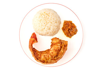 Gennevilliers, France - 01 02 2024: Still life. Close up of an American lobster tail plate with rice on a white background.