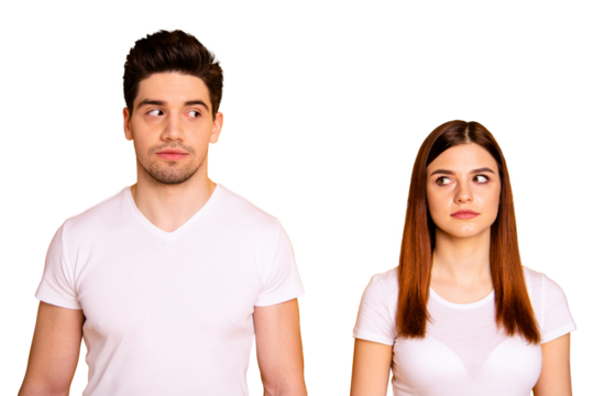 Close up photo two amazing beautiful she her he him his couple standing side by side look each other not smile tell talk speak say wear casual white t-shirts outfit clothes isolated yellow background - Powered by Adobe