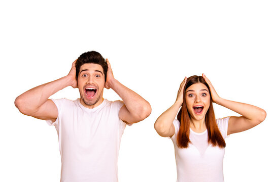 Close up photo two amazing beautiful she her he him his couple standing side by side oh yeah yes expression yelling unbelievable good news wear casual white t-shirts outfit isolated yellow background