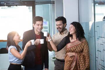 Office Friends Having A Coffee Together