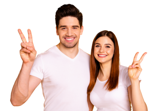 Close up photo funny amazing beautiful she her he him his guy lady hands arms show v-sign say hi cheer stand hugging sincere beaming smile wear casual white t-shirts outfit isolated yellow background