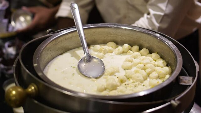 Close up shot of rasmalai or Malai rosogolla