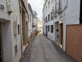 Iznajar village. Mountain village surrounded by the Iznajar Reservoir. Parish of Santiago Apostol. Iznajar Castle