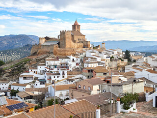 Iznajar village. Mountain village surrounded by the Iznajar Reservoir. Parish of Santiago Apostol....