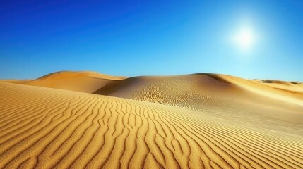 Serene Desert Landscape with Rippling Sand Dunes Under Bright Blue Sky and Radiant Sun