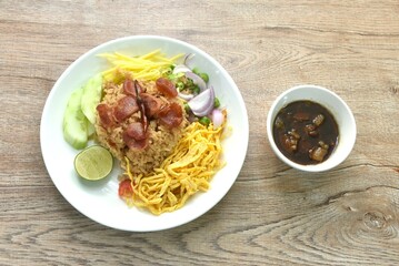 fried rice mixed with shrimp paste eat couple egg and vegetable on plate