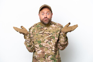 Military man isolated on white background having doubts while raising hands