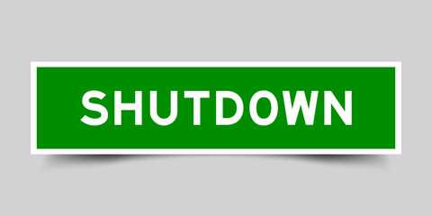 Square sticker label with word shutdown in green color on gray background