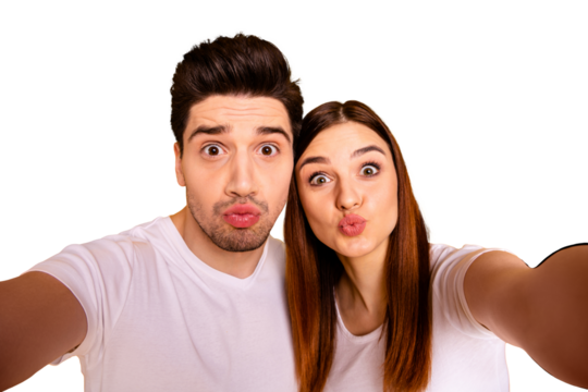 Self-portrait of his he her she two nice attractive cheerful cheery childish comic playful foolish people husband wife pout lips having fun isolated over vivid shine bright yellow background