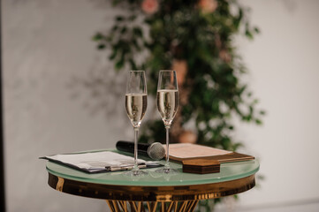 Elegant Wedding Toast Setup with Champagne and Notepad