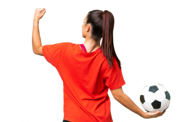 Young beauty woman over isolated chroma key background with soccer ball
