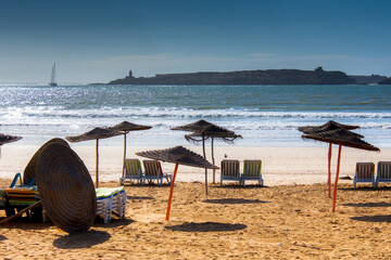 Palapas and chair installed the beach of Essaouira in the west of Morocco