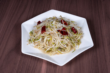 Fried mung bean sprouts on a white China plate
