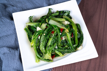 Sauteed vegetable on a white plate