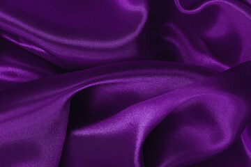 Dark purple fabric texture background, detail of silk or linen pattern.