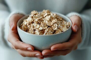 A rustic wooden bowl filled with fresh oats that exude warmth and organic goodness, symbolizing health and vitality, suitable for promoting natural food products.