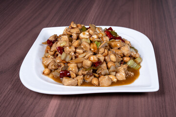 Kung Pao chicken on a white plate