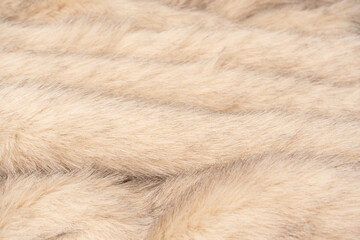 Texture of faux fur as a background, top view.