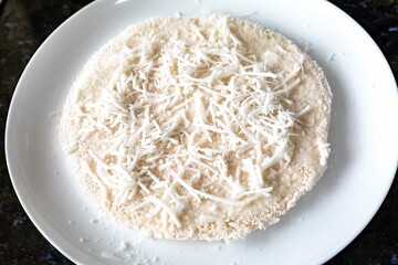 Traditional Brazilian tapioca with coconut served on a banana leaf. Amazonian tapioca