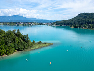 Lake Faak in Carinthia. Scenic aerial view to the island of the famous lake in Austria.