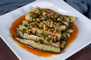 Eggplant salad on a white plate
