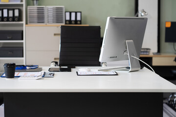 Work place concept : Mock up Blank screen computer desktop with keyboard in office or co-working background.