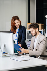 Diverse professionals collaborate on project analysis with financial graphs. Strategic teamwork and insights drive company growth and success.