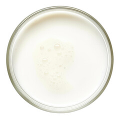 Top view of a glass bowl filled with milk isolated on a white background.