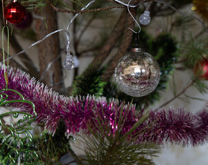 Christmas and New Year tree decorations on the branches of the tree