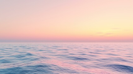 Fototapeta premium Photorealistic image of a soft pastel gradient sky blending pink, peach, and lavender hues at sunrise 