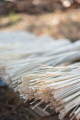 Bamboo strips are cut into small pieces and used for weaving or tying things.