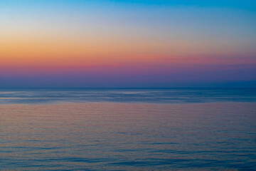 Sunset over sea background with empty space for text.