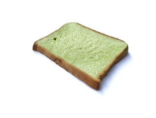 one slice of pandan flavored toast bread isolated on white background. High angle view 