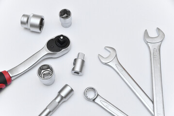 Metal chrome horn and socket wrenches with adapters and ratchet for repairs