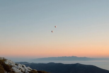 In a serene twilight setting, three planets align in the sky above rugged mountains and a calm sea, creating a breathtaking view that inspires wonder and curiosity about the universe