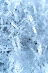 Texture of snow crystals. Abstract white natural background 